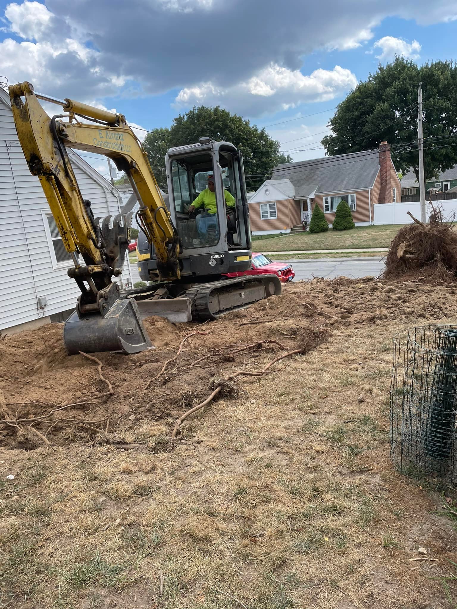 Excavator operating on site